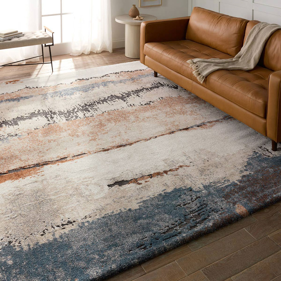 white, grey, orange rug