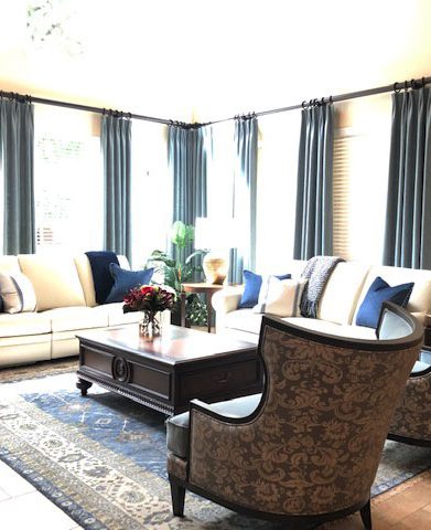 pretty tan and blue rug in living room