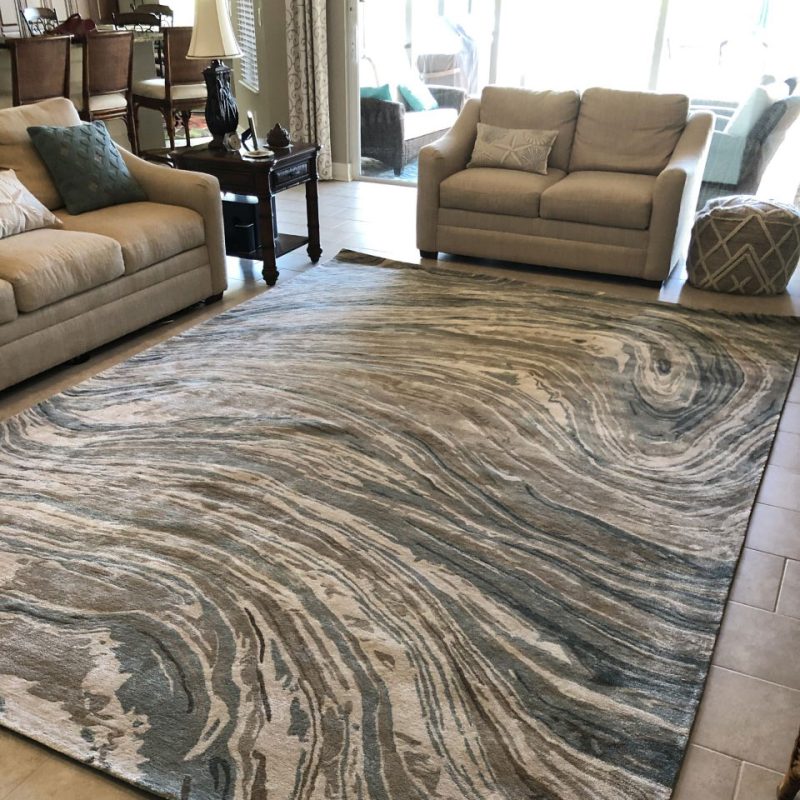blues and greys swirly colored rug